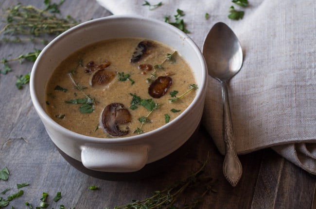 Forest Mushroom Bisque- this nourishing clean eating soup recipe made with onions, carrots, leeks, mushrooms,olive oil,and coconut milk is vegetarian, vegan, dairy free, gluten free, and Whole30 compliant! AND super delicious!|thekitcheneer.com