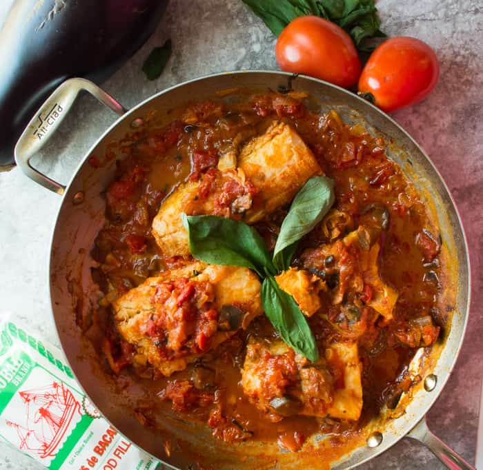 Baccala alla Eggplant –also known as Cod Sautéed in an Eggplant Tomato Sauce- a super easy and delicious Whole30 one skillet meal recipe that is perfect for a quick weeknight dinner that only sounds fancy and done in less than 30 minutes! 