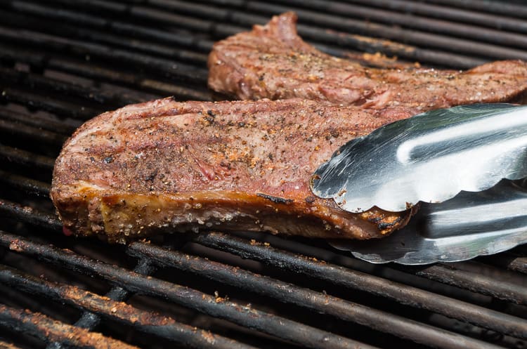 Perfect Grilled Bison Steaks with a Compound Herb Clarified Butter- the best grilled steak recipe topped with melty herb butter will make a great summer weeknight dinner!|thekitcheneer.com