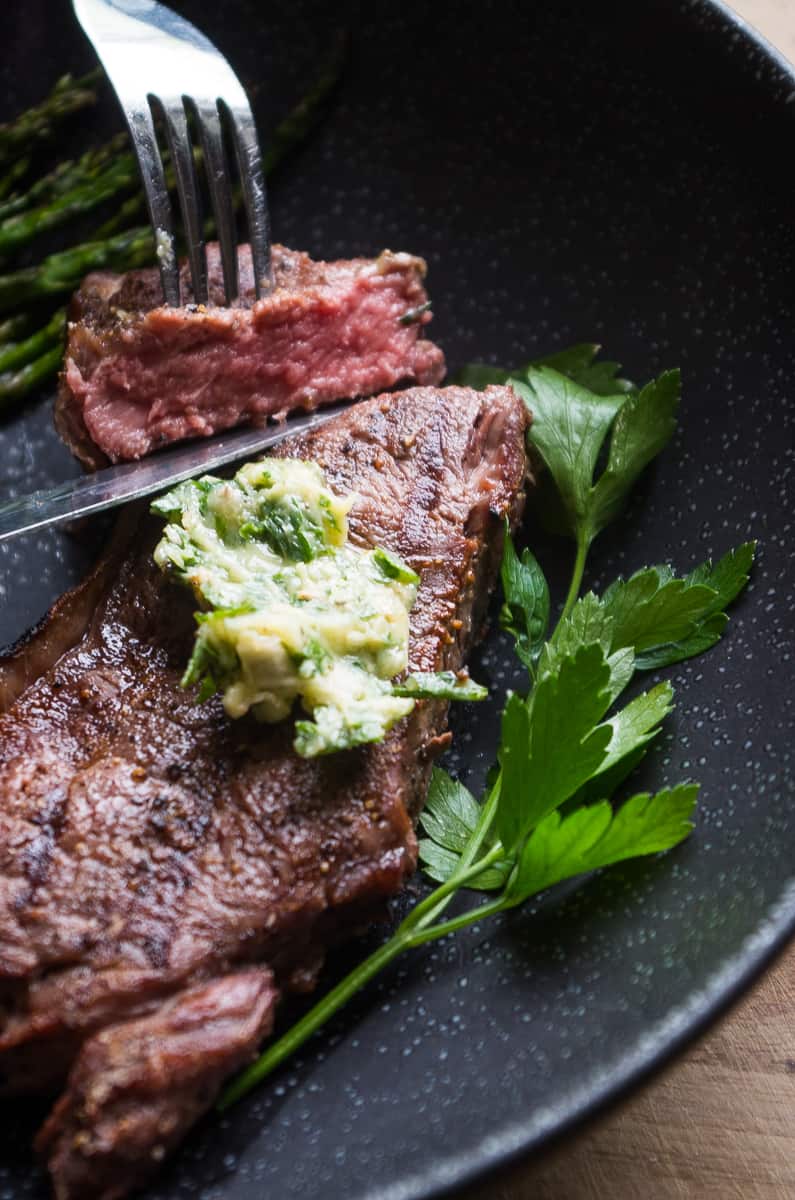 Perfect Grilled Bison Steaks with a Compound Herb Clarified Butter- the best grilled steak recipe topped with melty herb butter will make a great summer weeknight dinner!|thekitcheneer.com