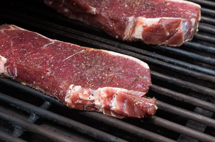 Perfect Grilled Bison Steaks with a Compound Herb Clarified Butter- the best grilled steak recipe topped with melty herb butter will make a great summer weeknight dinner!|thekitcheneer.com