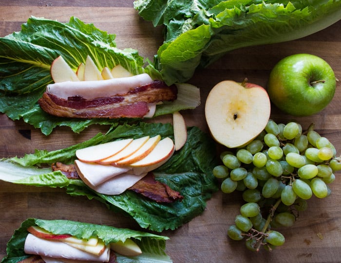 Whole30 Turkey Apple Club Lettuce Wraps- the easy cold lunch recipe for when you are on a Whole30 or just want an awesome lunch. Turkey, apples, and bacon all wrapped in lettuce. YUM|thekitcheneer.com