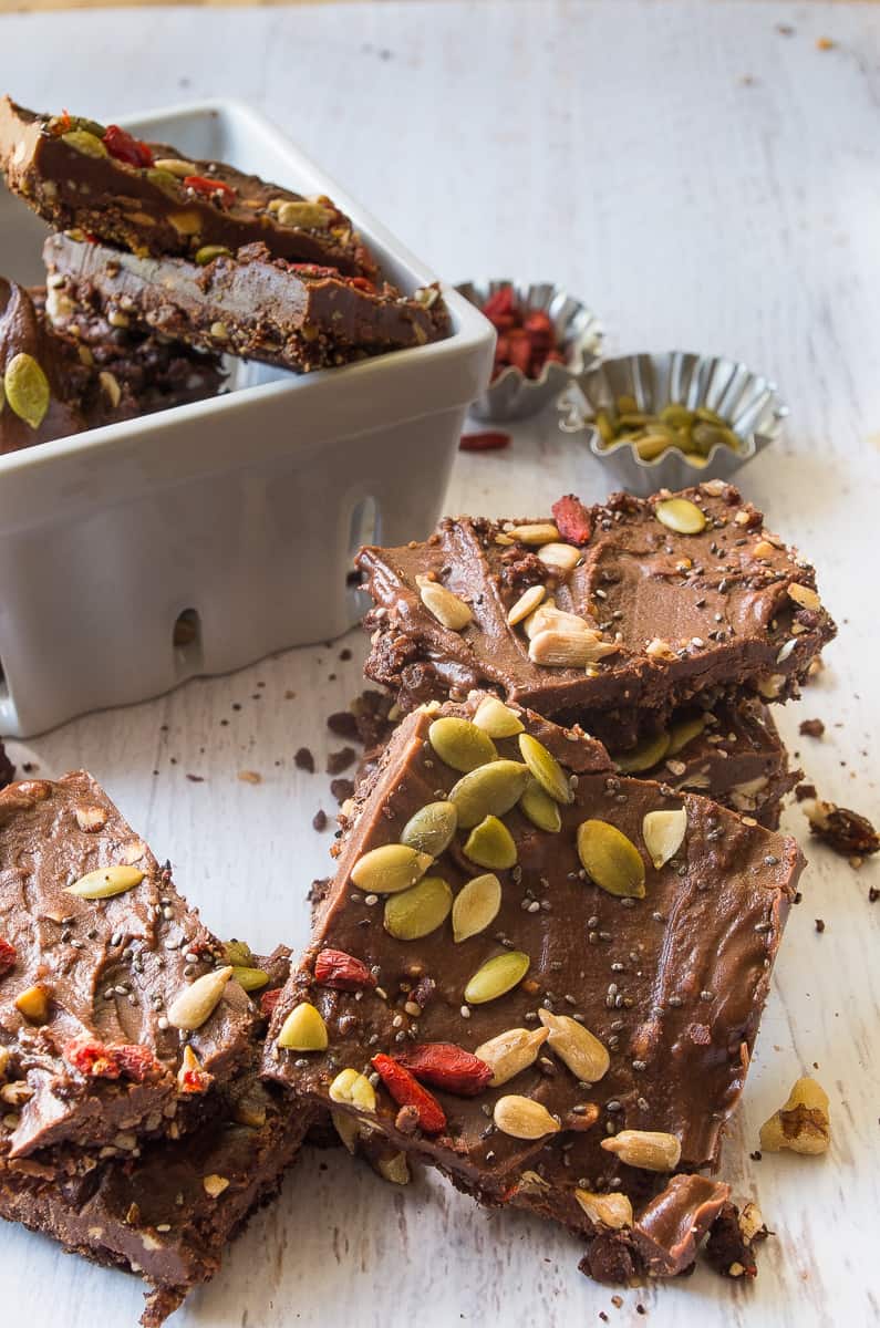 These raw and no bake superfood chocolate seed and nut bars are the perfect post workout snack or anytime healthy snack that takes as little as 30 minutes!