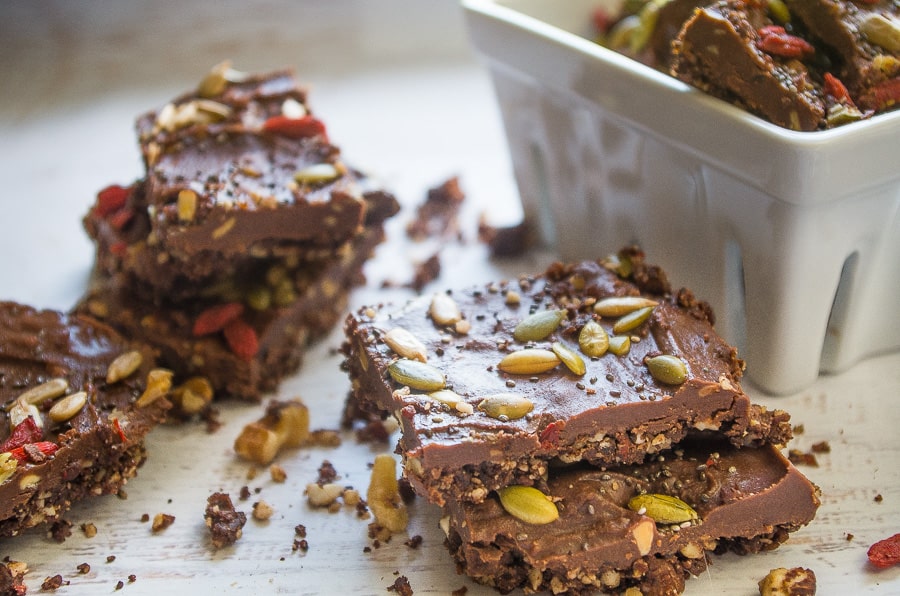 These raw and no bake superfood chocolate seed and nut bars are the perfect post workout snack or anytime healthy snack that takes as little as 30 minutes!