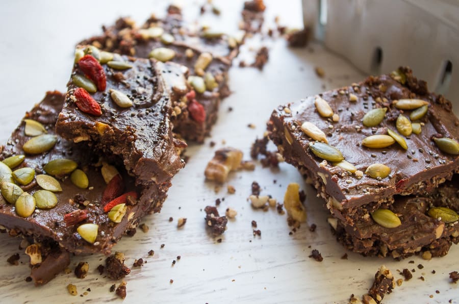 These raw and no bake superfood chocolate seed and nut bars are the perfect post workout snack or anytime healthy snack that takes as little as 30 minutes!