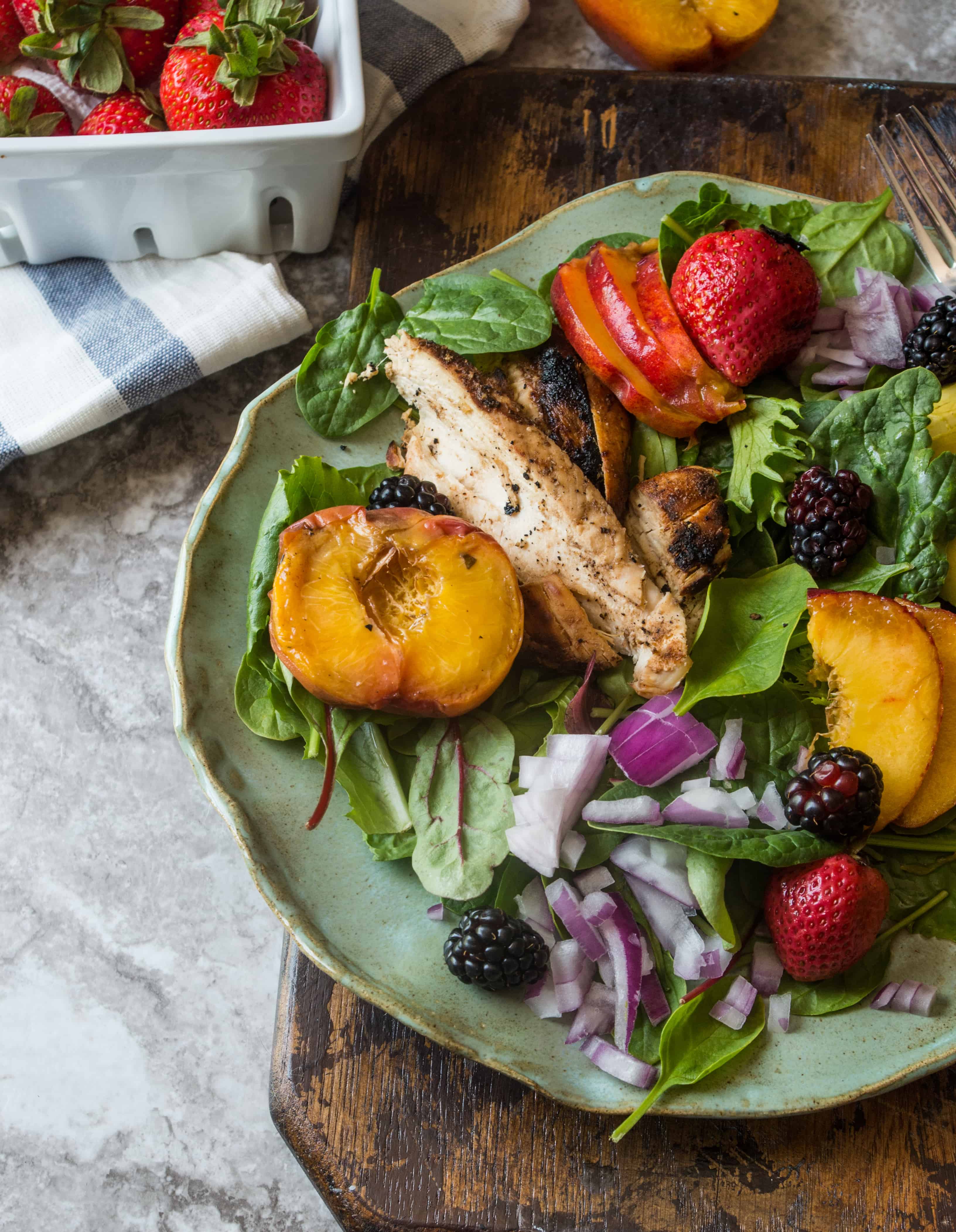 Grilled Peach and Strawberry Summer Salad- a simple Whole30 summer salad that will be on repeat all during grilling season! |thekitcheneer.com
