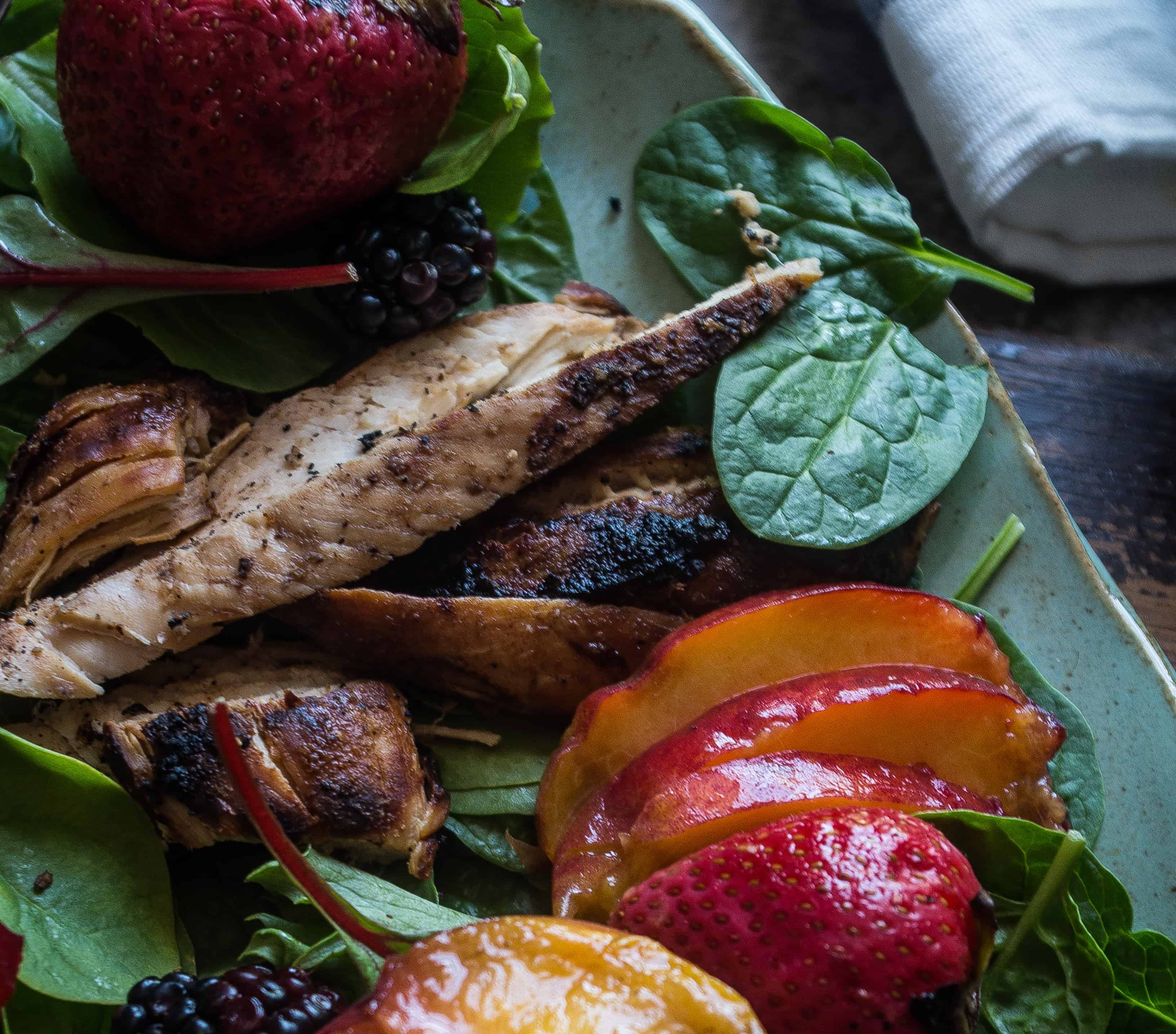 Grilled Peach and Strawberry Summer Salad- a simple Whole30 summer salad that will be on repeat all during grilling season! |thekitcheneer.com