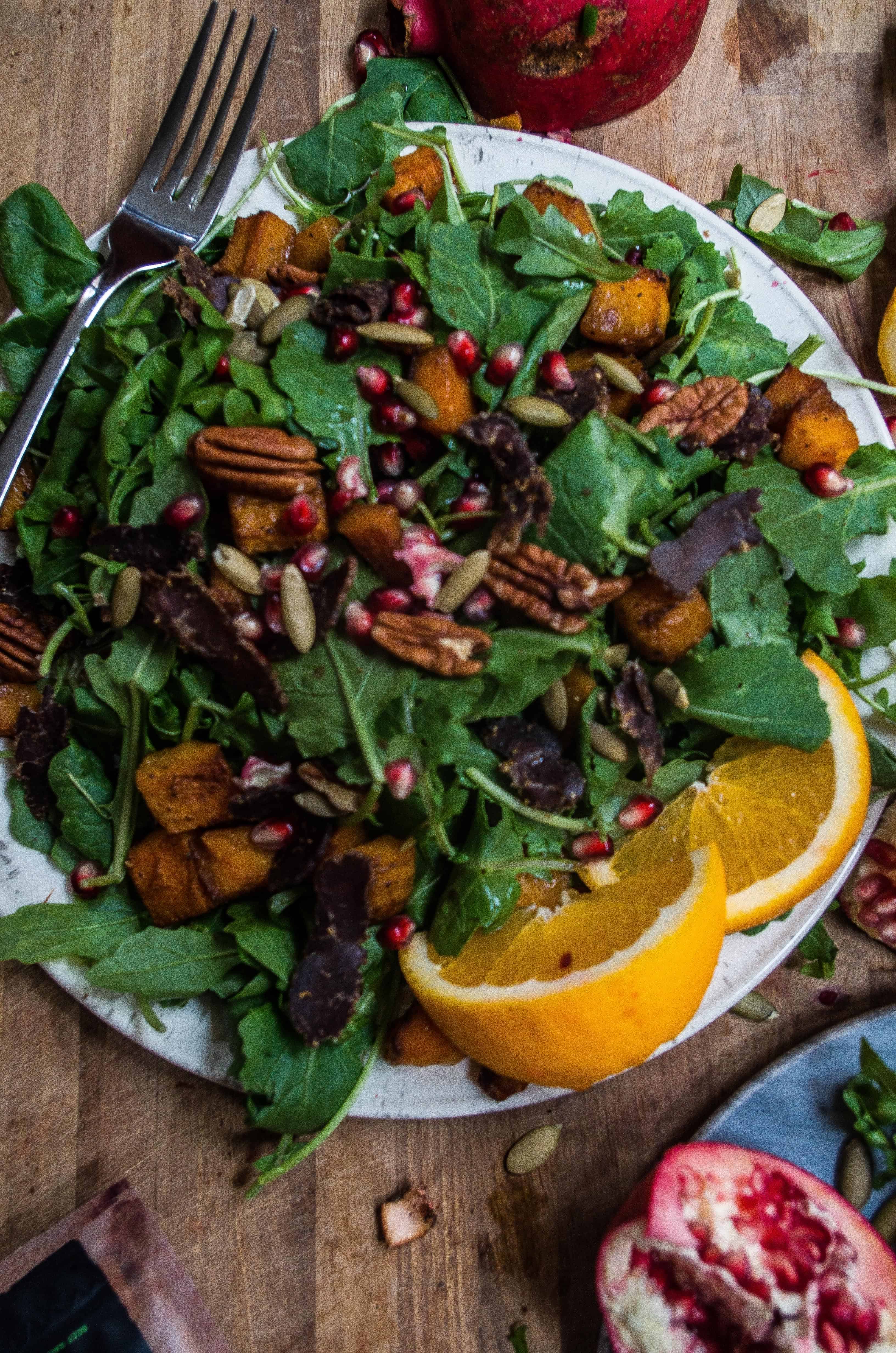 Pomegranate Bacon and Roasted Squash Salad- perfect fall salad and side for Thanksgiving dinner!|thekitcheneer.com