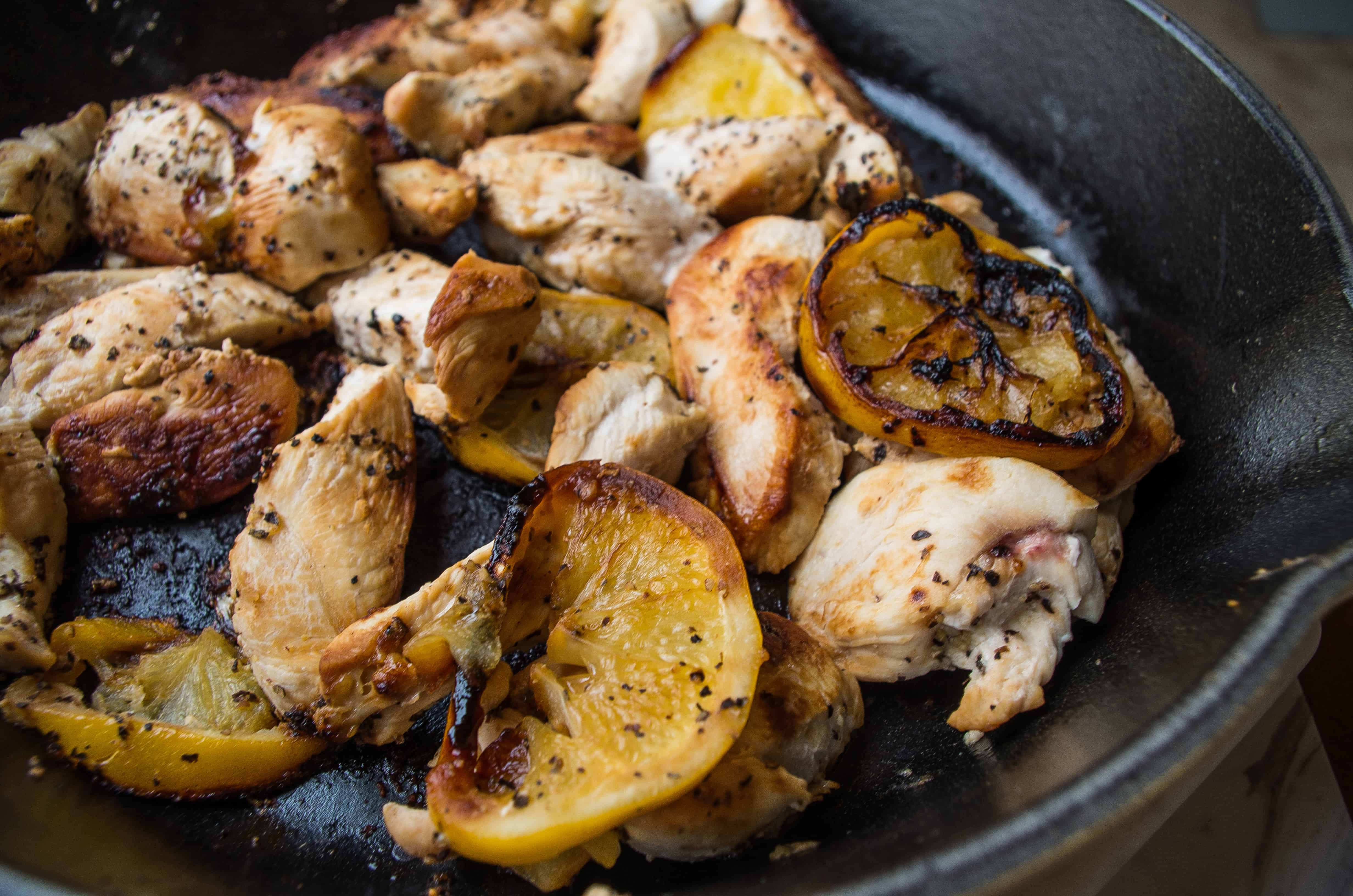 An herby, protein-packed power salad featuring all the green things, apples, avocados, and caramelized lemony chicken for your new go to Spring salad recipe! |thekitcheneer.com