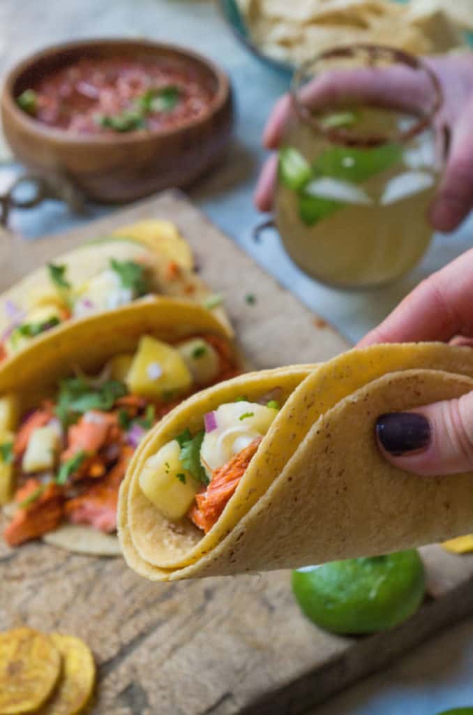 Fish Tacos Al Pastor- these ar SO easy and mind blowingly delicious. Simply blend the marinade add fish of choice plus a quick pineapple salsa to add even more flavor. #glutenfree #dairyfree #cincodemayo #tacotuesday