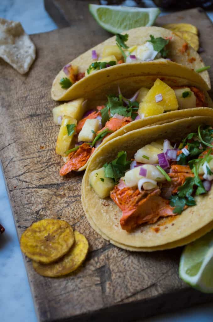 Fish Tacos Al Pastor- these ar SO easy and mind blowingly delicious. Simply blend the marinade add fish of choice plus a quick pineapple salsa to add even more flavor. #glutenfree #dairyfree #cincodemayo #tacotuesday