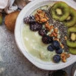 This super fun and summery way to get all your nutrients all at once. This Superfood Mermaid Smoothie Bowl has turned into one of my new favorites to cool off as my post-workout meal. Made with blue green algae powder (Spirulina), bananas, chia seeds, collagen protein, blueberries, and topped with even more superfood toppings its pretty much summer in a bowl.