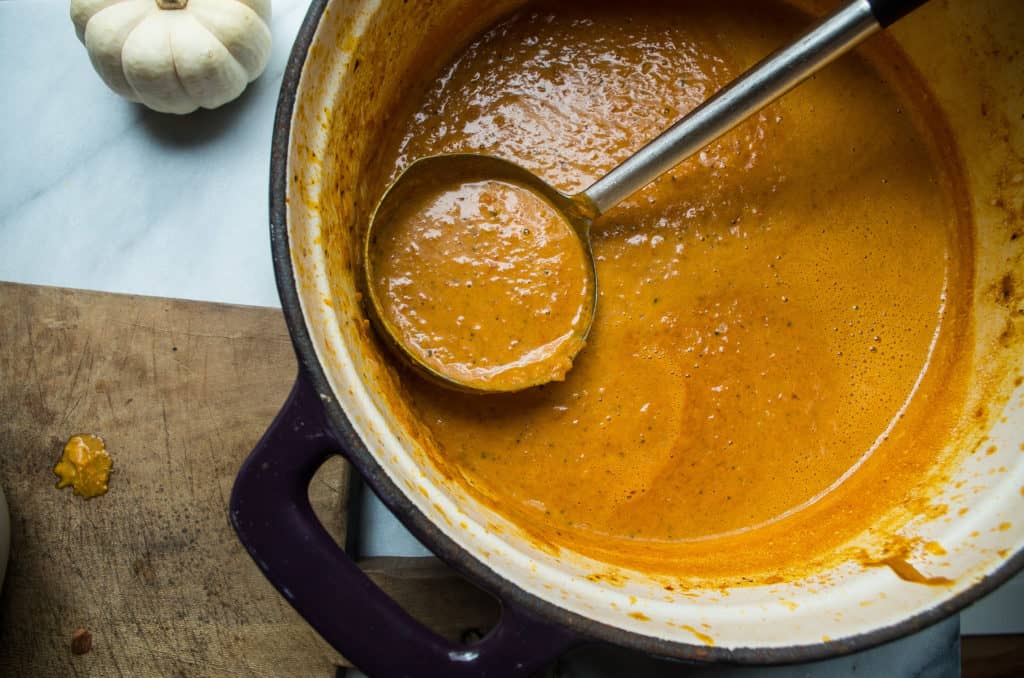 Creamy, delicious, HEARTY, AND vegetarian Whole30 pumpkin soup is here! And it has a secret ingredient that adds an unexpected depth of flavor: almond butter.