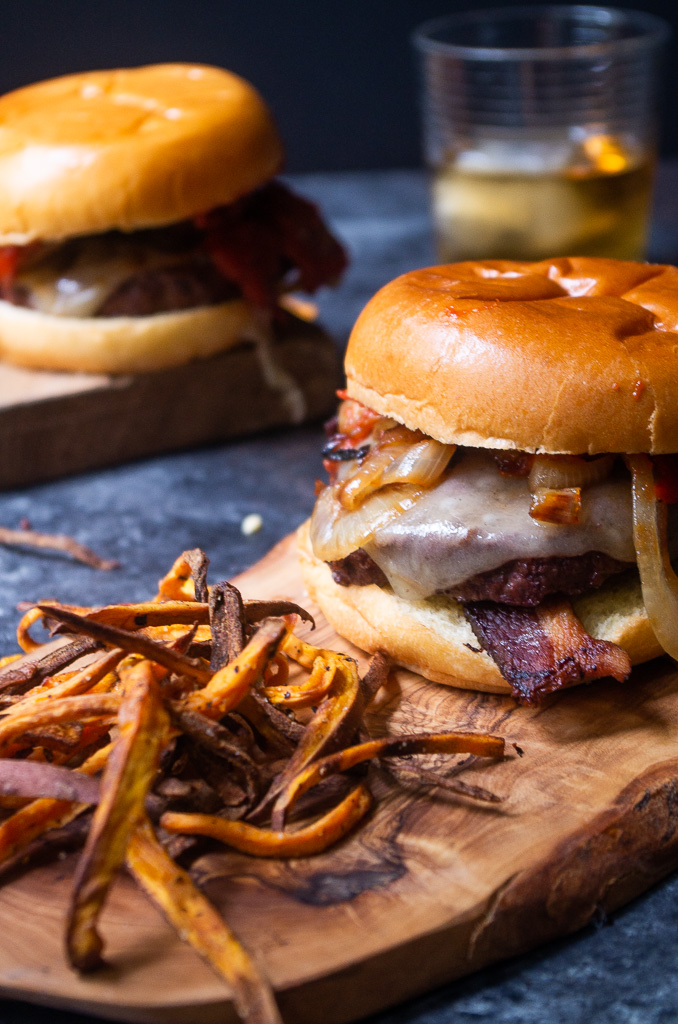 Maple Bourbon Bacon Burgers on wooden plank