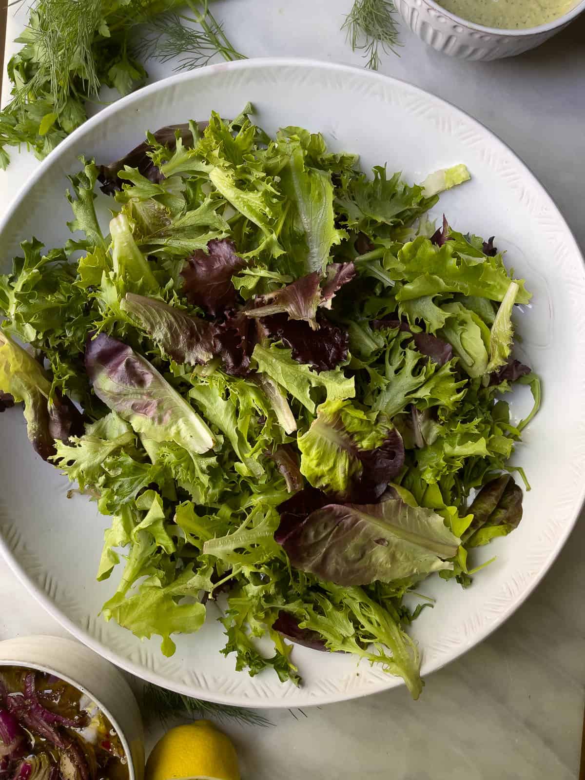 Simple Green Spring Salad with Herby Tahini Dressing - The Kitcheneer