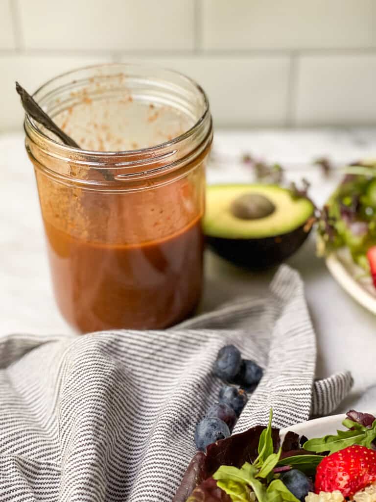 Mason jar with strawberry balsamic vinaigrette