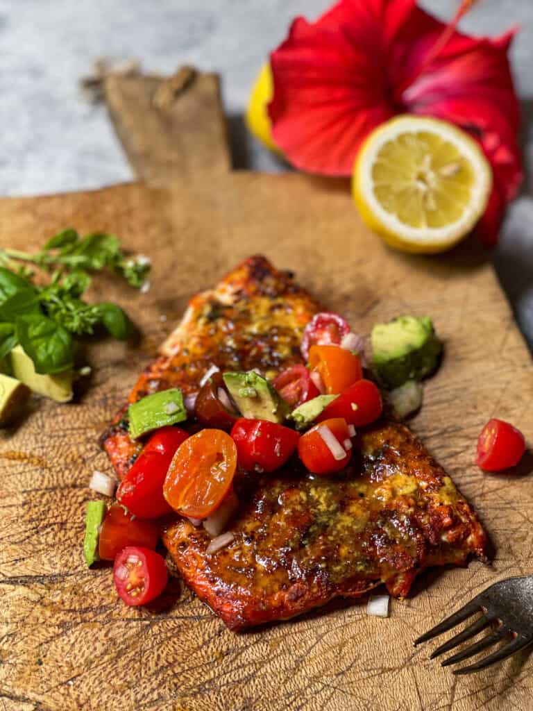 Grilled salmon on a wooden plank 