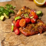 Grilled salmon on a wooden plank