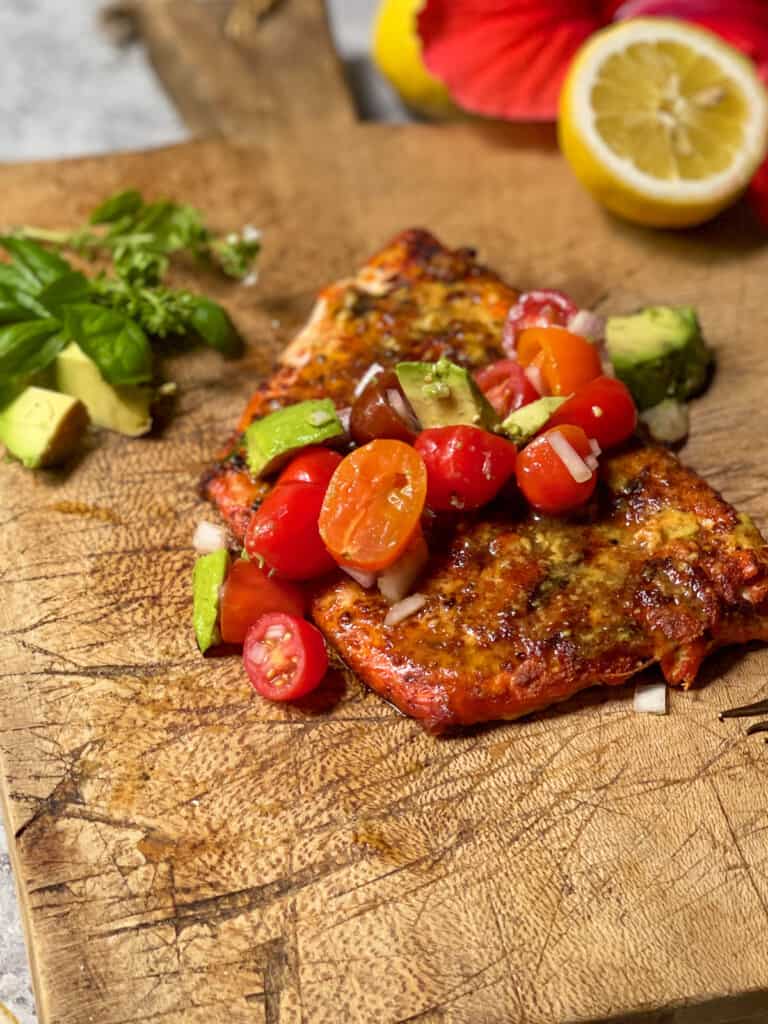 Grilled salmon on a wooden plank 
