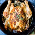 Whole Roasted Chicken in a cast iron skillet