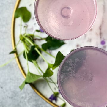 Learn how to make a classic cocktail with a twist - Lavender French 75 recipe. Perfect Spring Cocktail for Mother's Day!